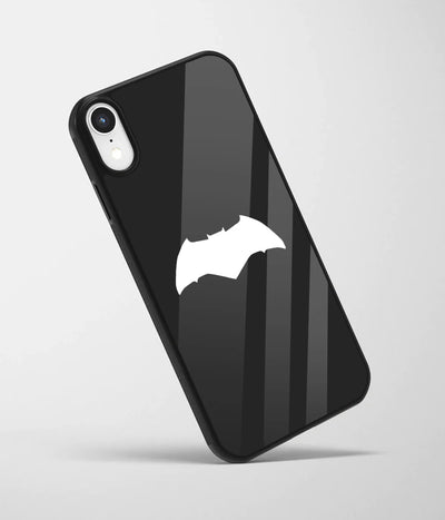 An angled view of a glass phone case featuring a vibrant design.