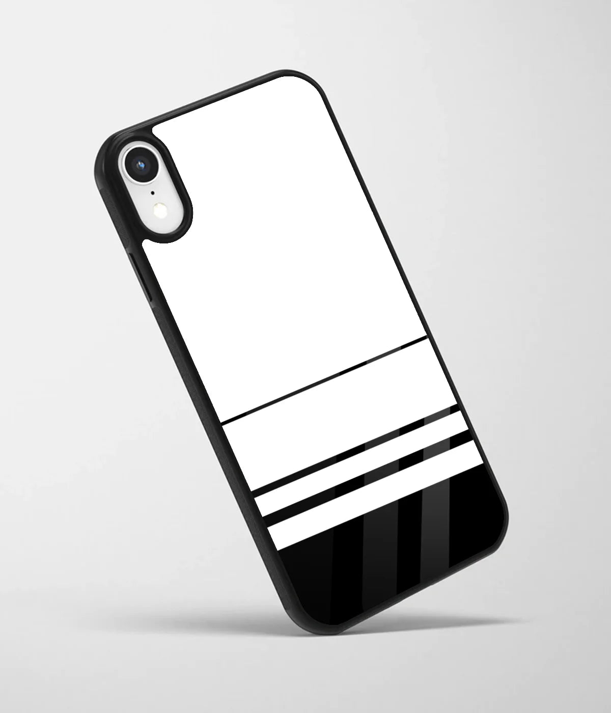 An angled view of a glass phone case featuring a vibrant design.