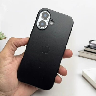 Hand holding a black leather MagSafe case for iPhone.
