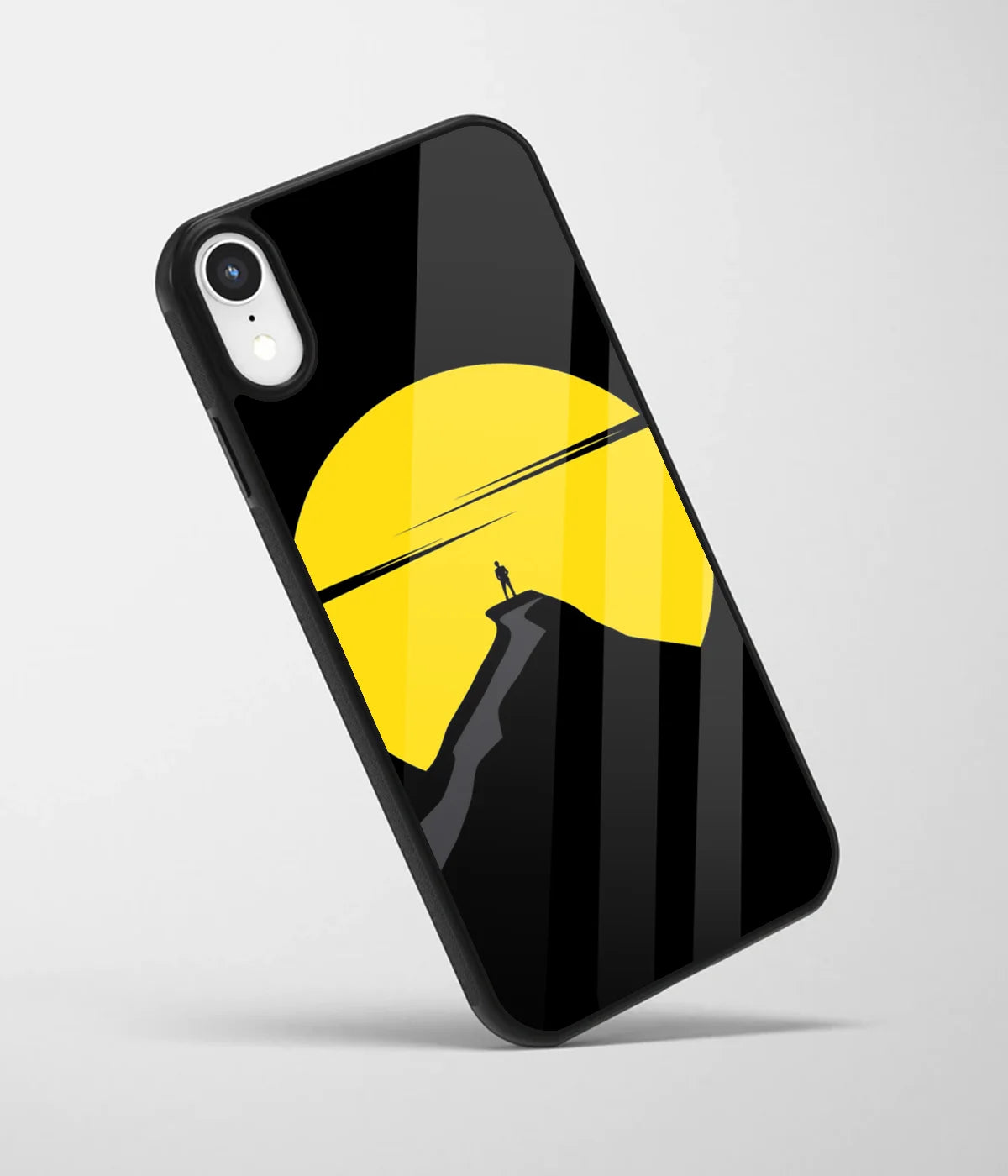 An angled view of a glass phone case featuring a vibrant design.