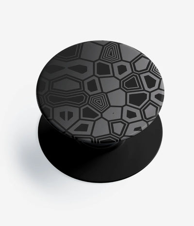 A top-down view of a phone grip holder on a clean white background