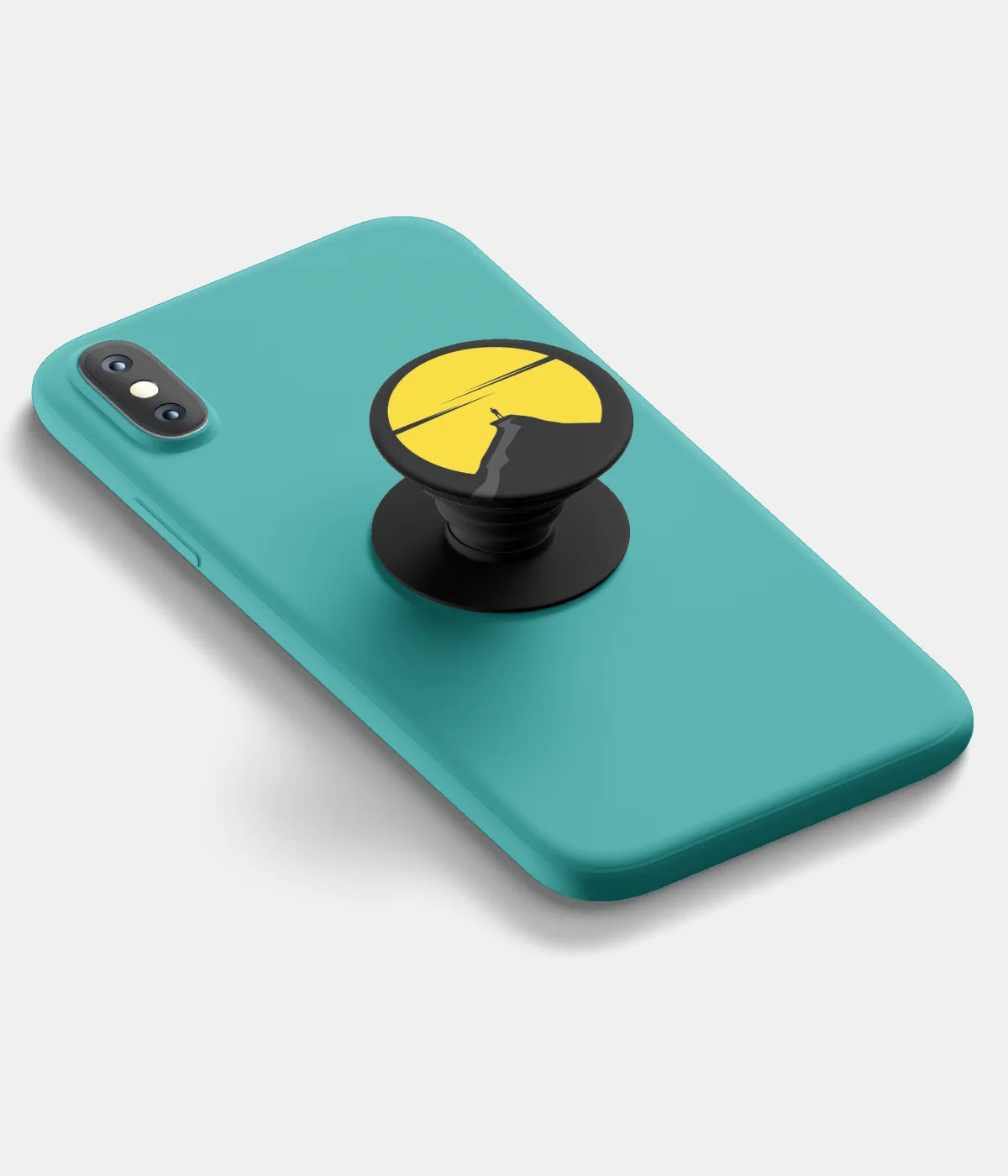 A top-down view of a phone grip holder attached to a mobile phone case on a white background