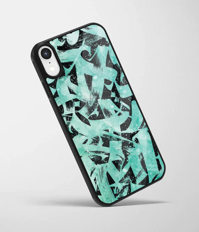 An angled view of a glass phone case featuring a vibrant design.