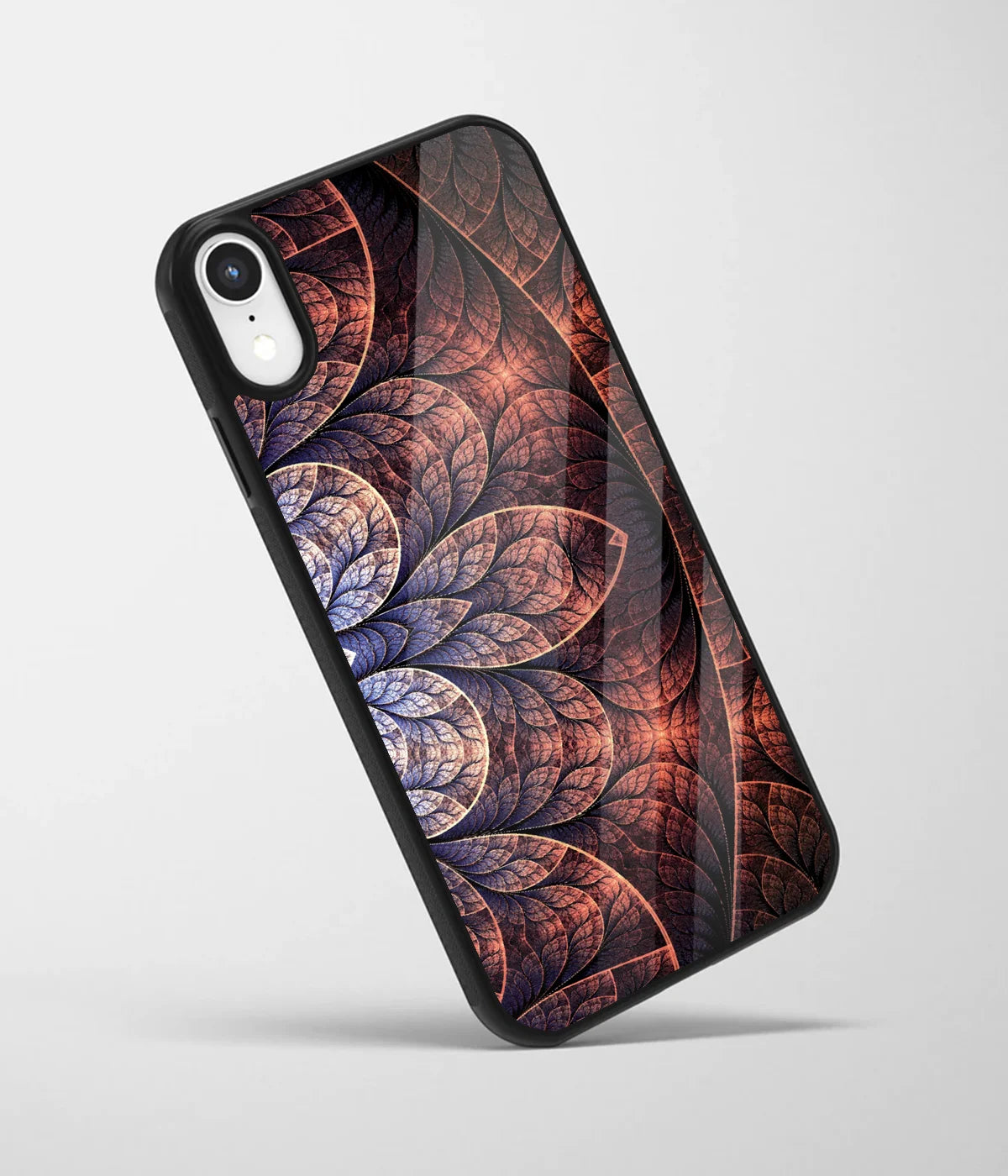 An angled view of a glass phone case featuring a vibrant design.