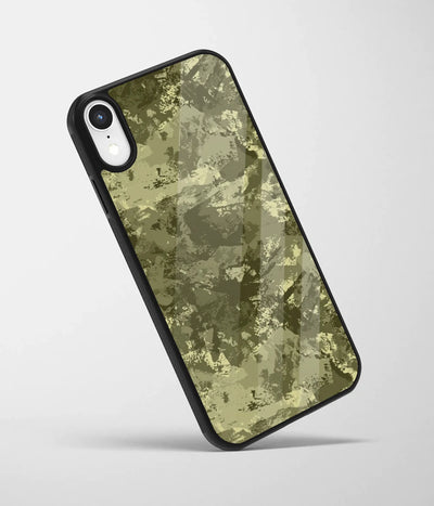 An angled view of a glass phone case featuring a vibrant design.