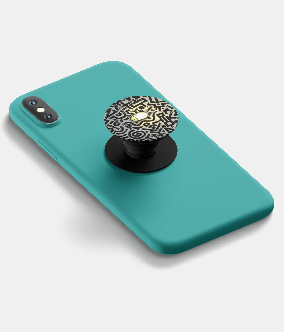 A top-down view of a phone grip holder attached to a mobile phone case on a white background