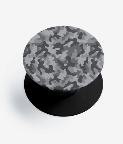 A top-down view of a phone grip holder on a clean white background