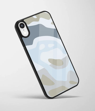An angled view of a glass phone case featuring a vibrant design.