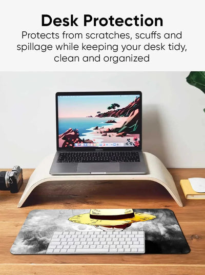 Casemonkey desk mat protecting a wooden desk surface from scratches, scuffs, and spills, illustrating the desk protection feature for a clean and organized workspace.