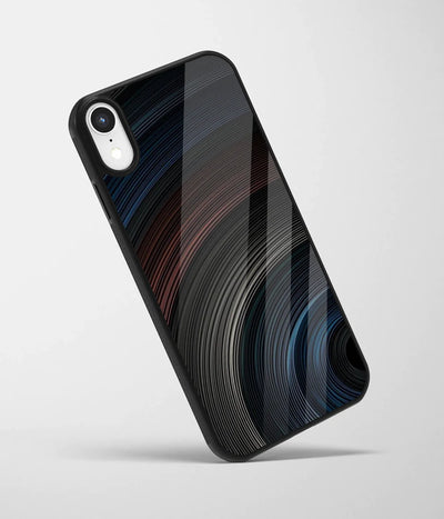 An angled view of a glass phone case featuring a vibrant design.