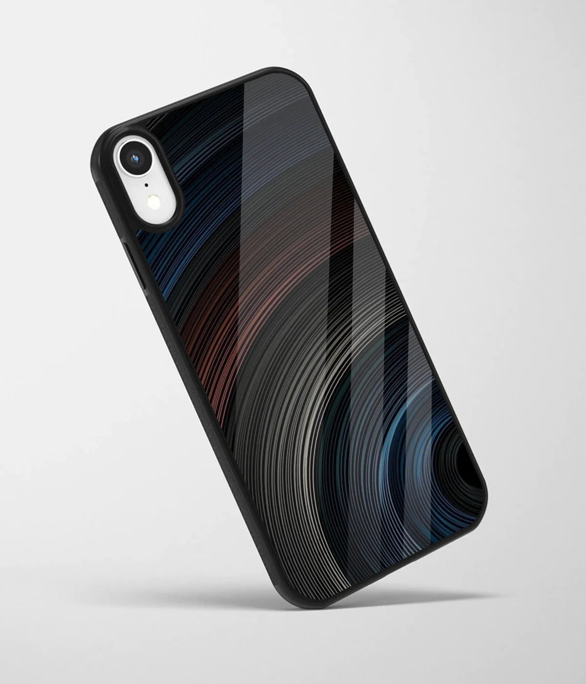 An angled view of a glass phone case featuring a vibrant design.