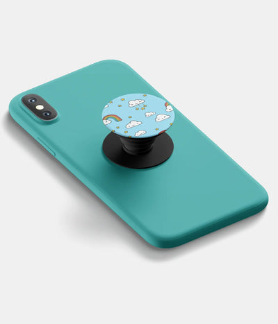 A top-down view of a phone grip holder attached to a mobile phone case on a white background