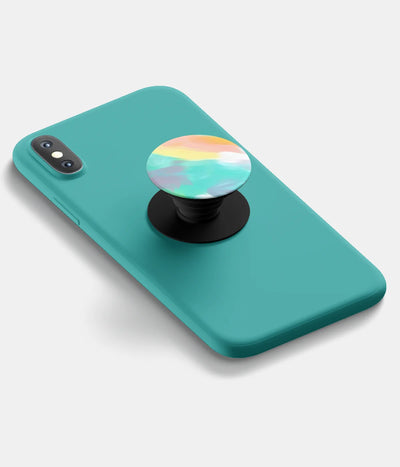A top-down view of a phone grip holder attached to a mobile phone case on a white background