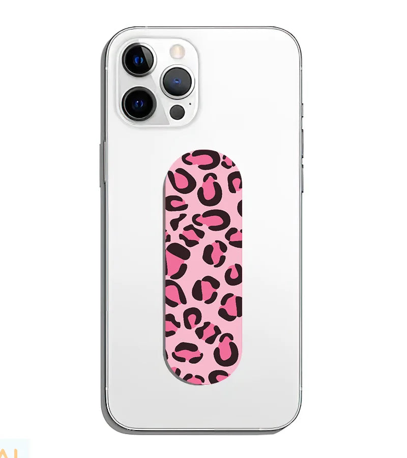 A phone grip slider applied to the back of a smartphone.