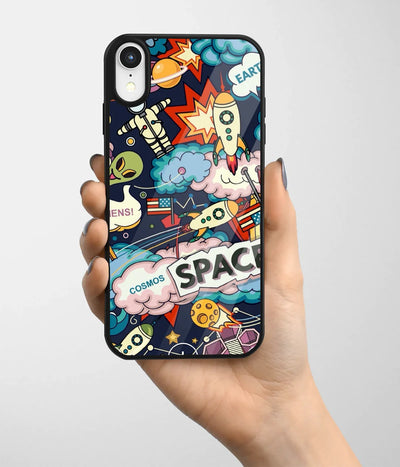 A hand holding a glass phone case with a colorful design.