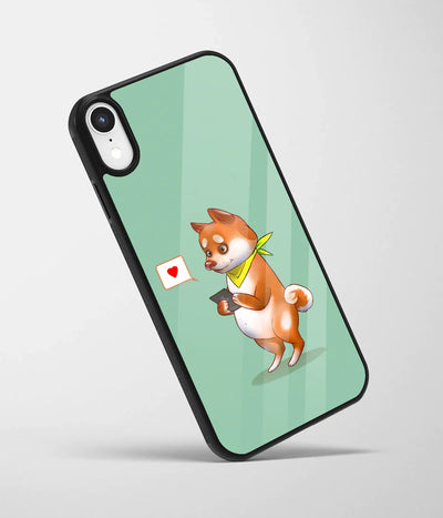 An angled view of a glass phone case featuring a vibrant design.