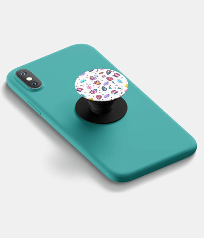 A top-down view of a phone grip holder attached to a mobile phone case on a white background