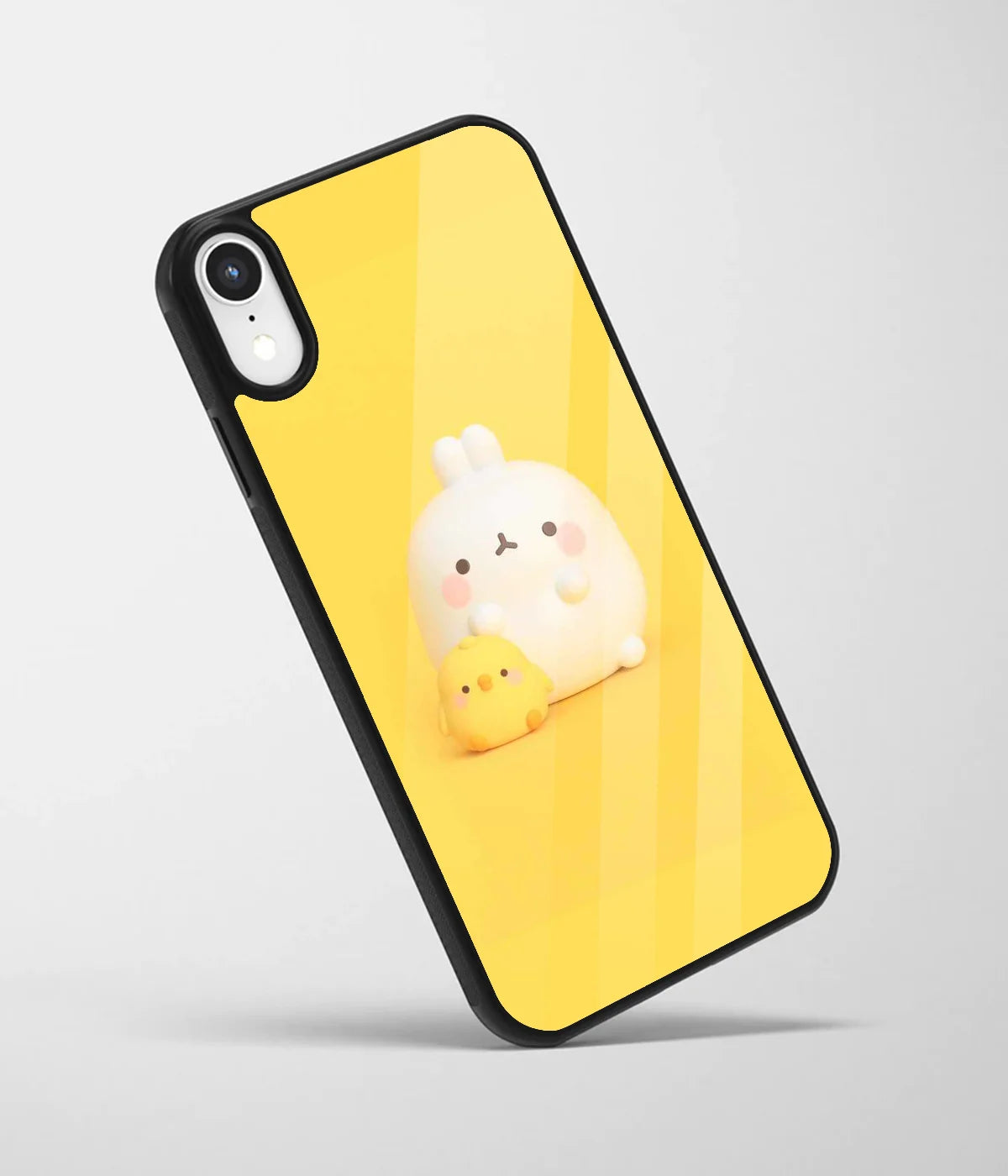 An angled view of a glass phone case featuring a vibrant design.