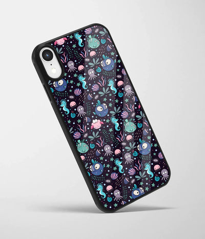 An angled view of a glass phone case featuring a vibrant design.