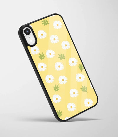 An angled view of a glass phone case featuring a vibrant design.
