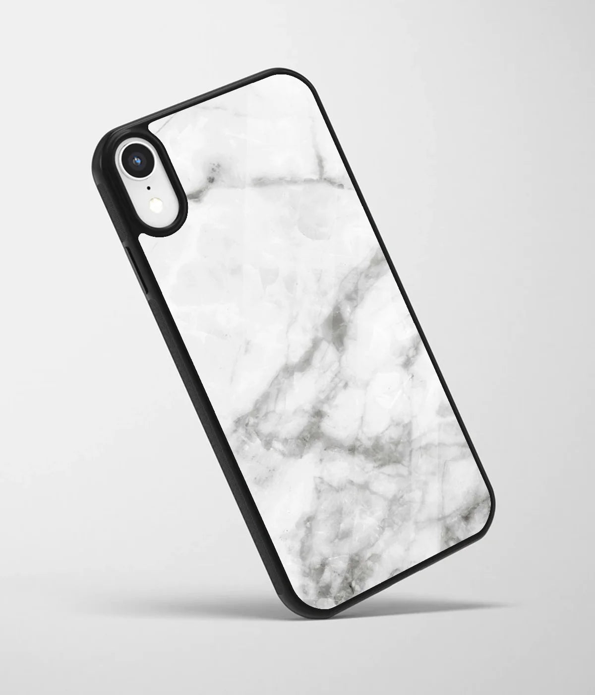 An angled view of a glass phone case featuring a vibrant design.