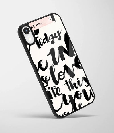 An angled view of a glass phone case featuring a vibrant design.