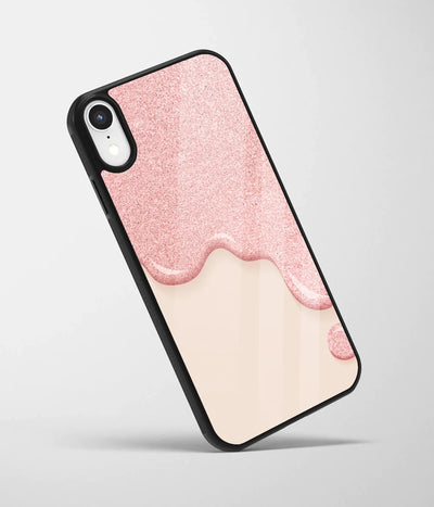 An angled view of a glass phone case featuring a vibrant design.