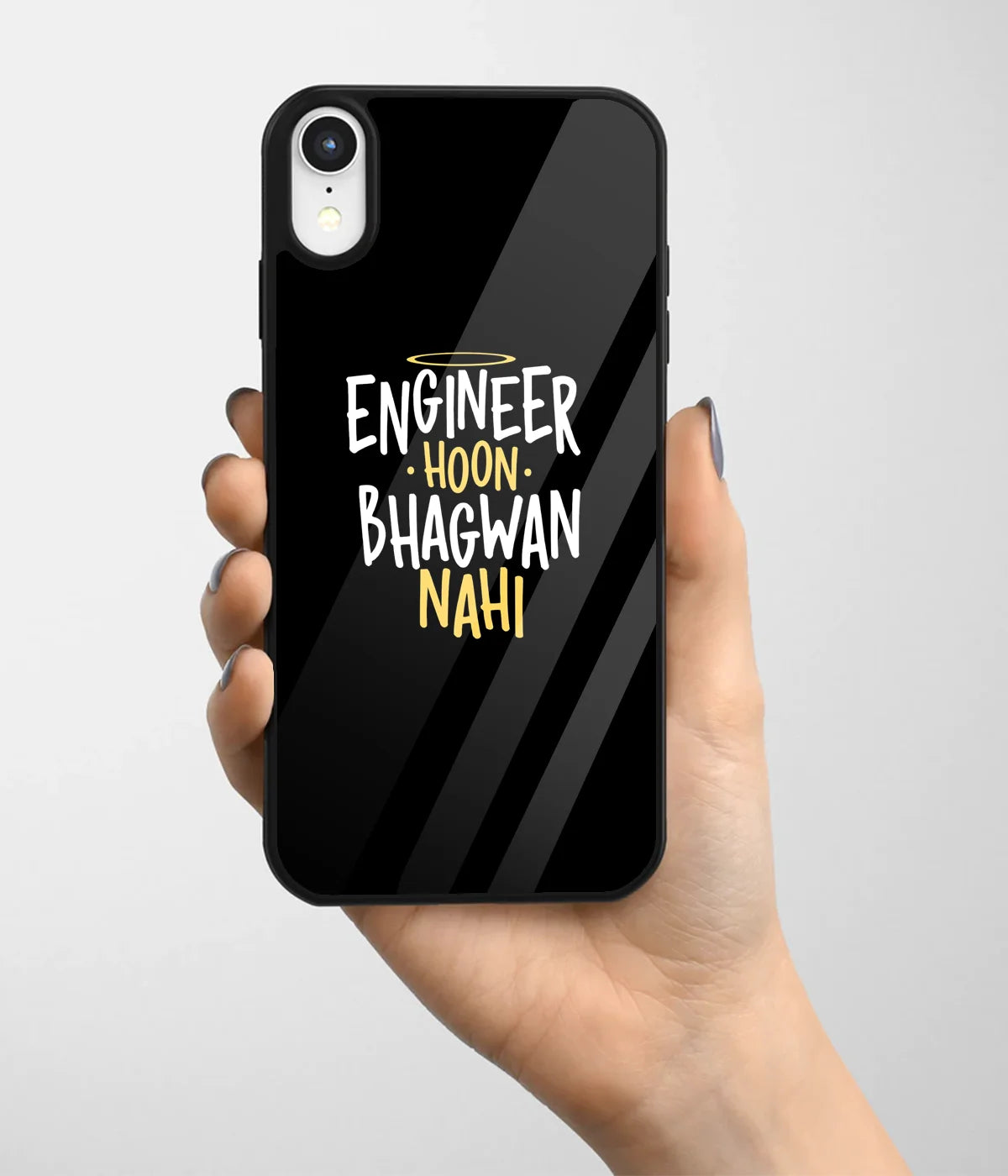 A hand holding a glass phone case with a colorful design.