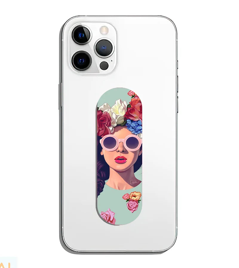 A phone grip slider applied to the back of a smartphone.
