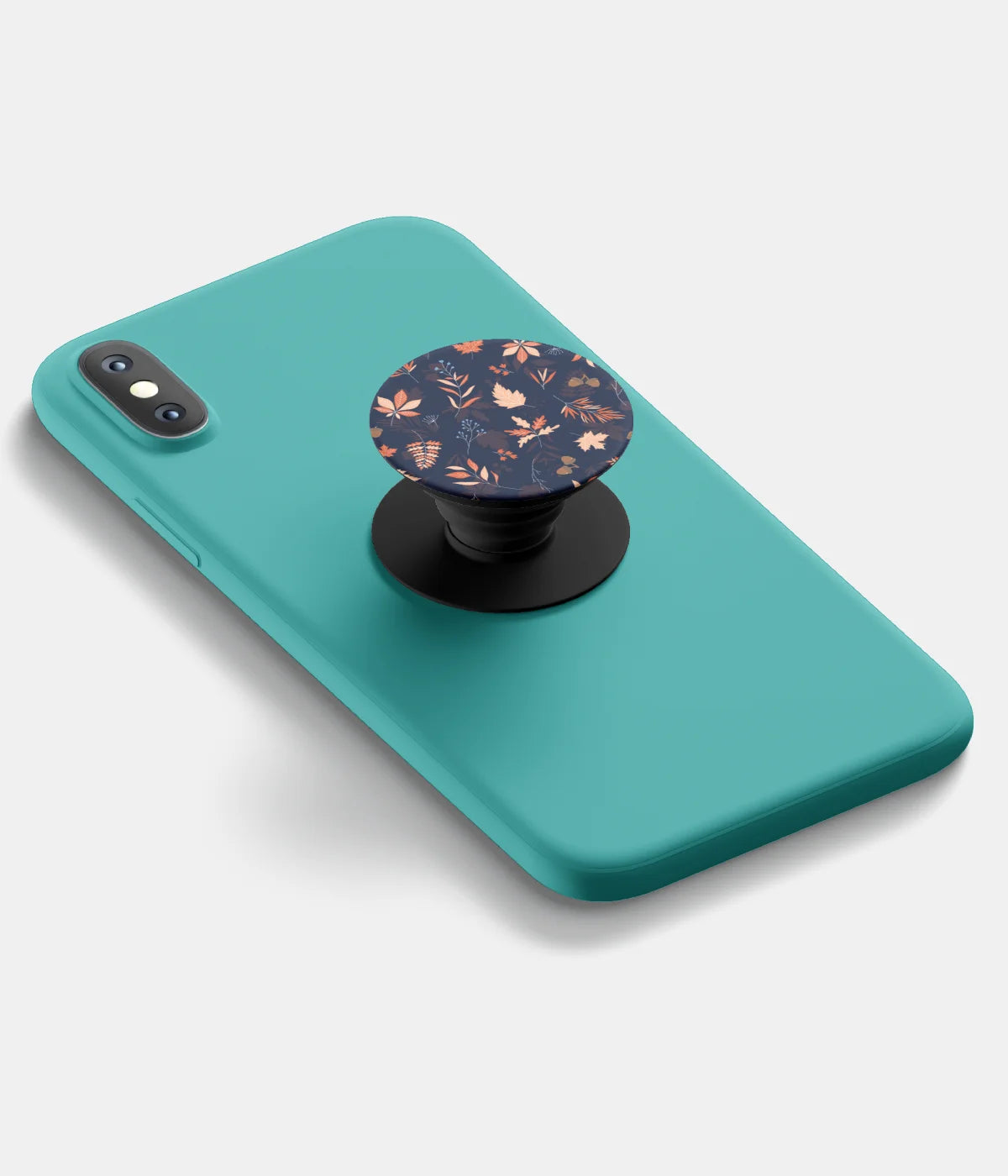 A top-down view of a phone grip holder attached to a mobile phone case on a white background