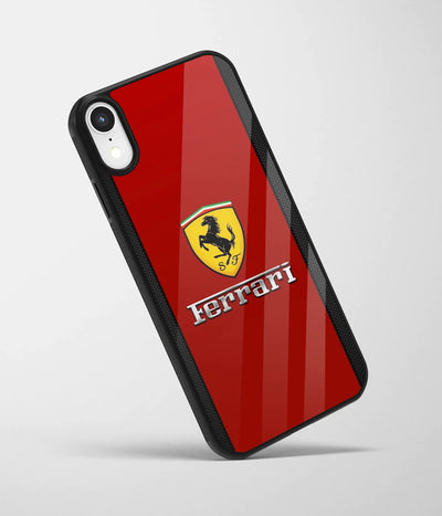 An angled view of a glass phone case featuring a vibrant design.