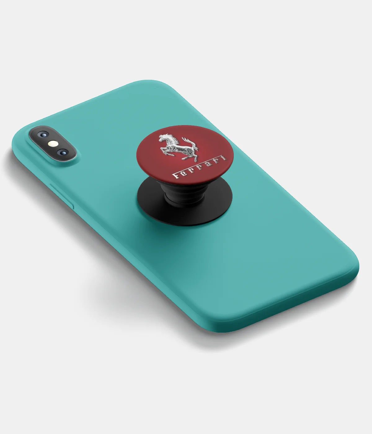 A top-down view of a phone grip holder attached to a mobile phone case on a white background