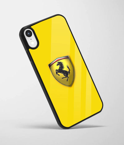 An angled view of a glass phone case featuring a vibrant design.