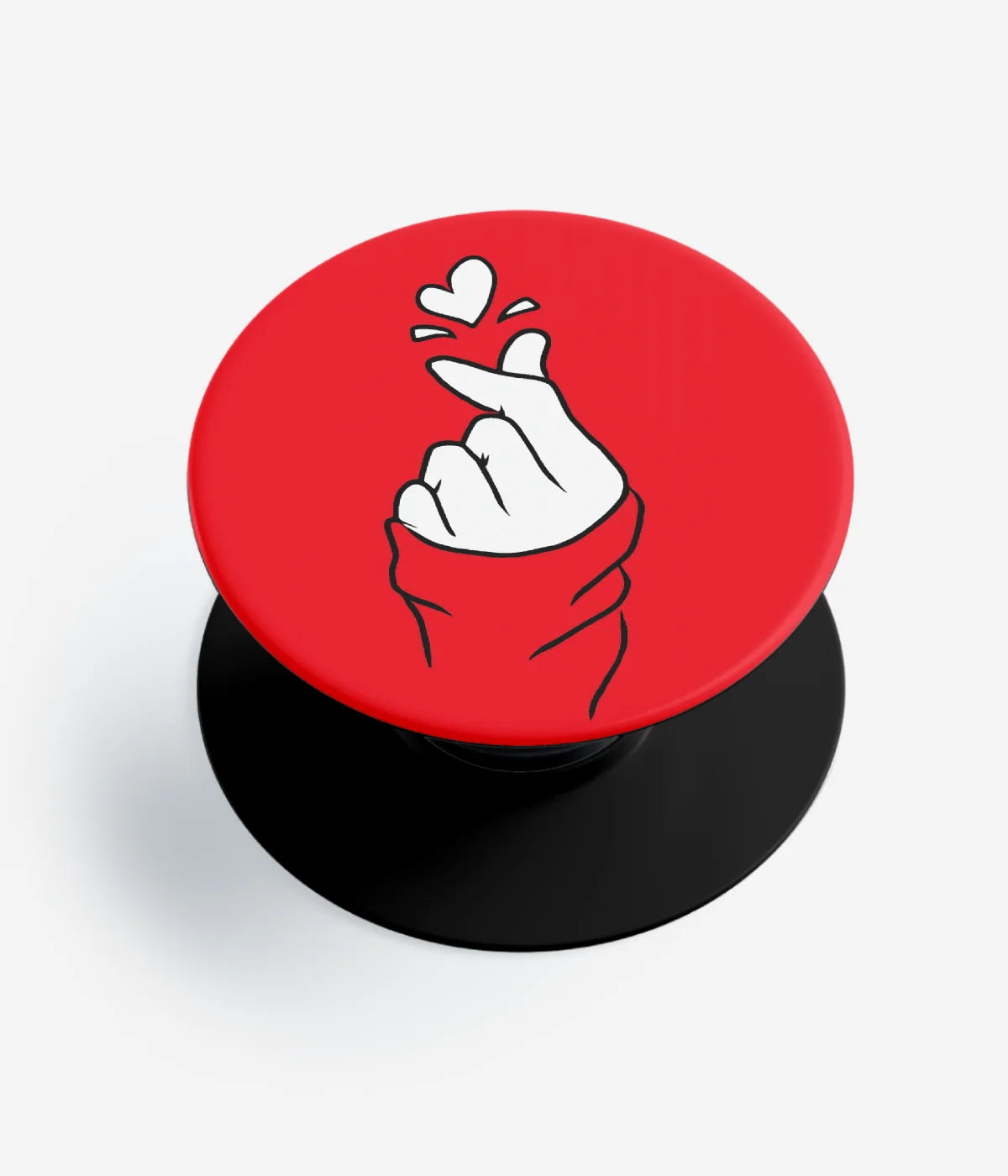 A top-down view of a phone grip holder on a clean white background