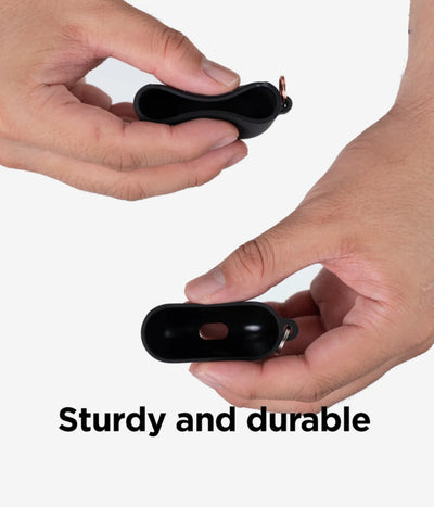 Demonstration of the flexibility and durability of a liquid silicone Airpods case.