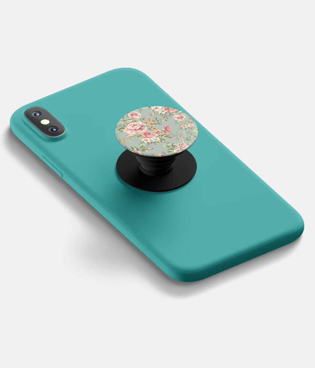 A top-down view of a phone grip holder attached to a mobile phone case on a white background