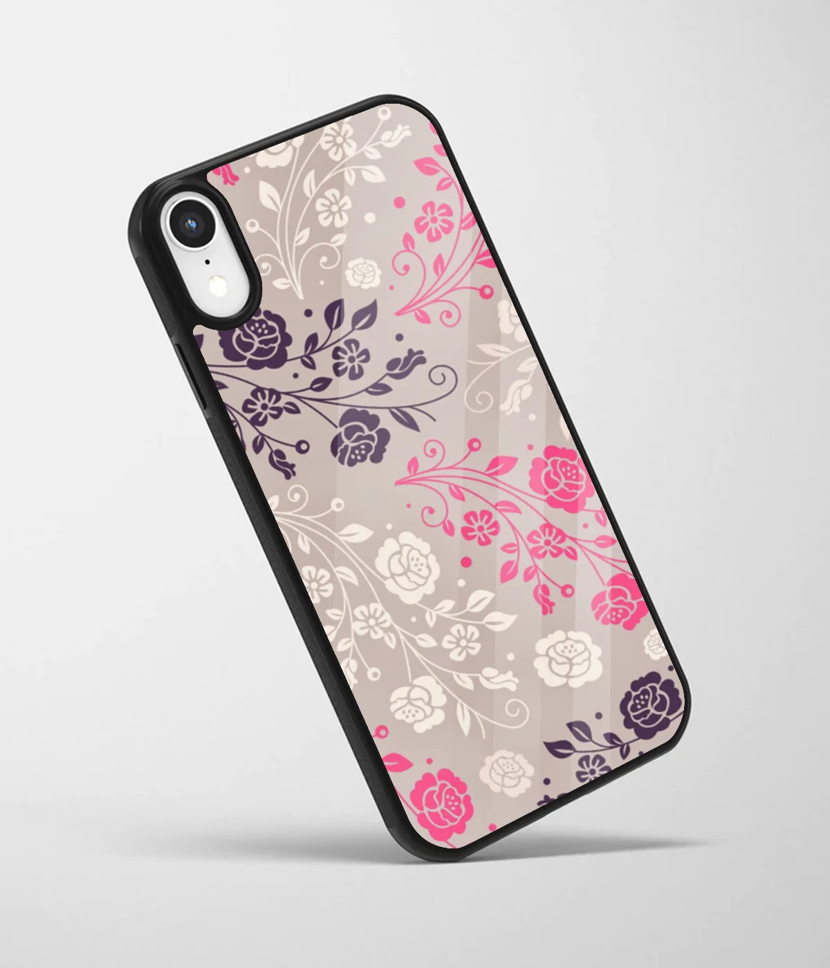 An angled view of a glass phone case featuring a vibrant design.