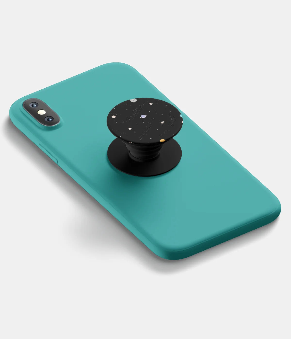 A top-down view of a phone grip holder attached to a mobile phone case on a white background
