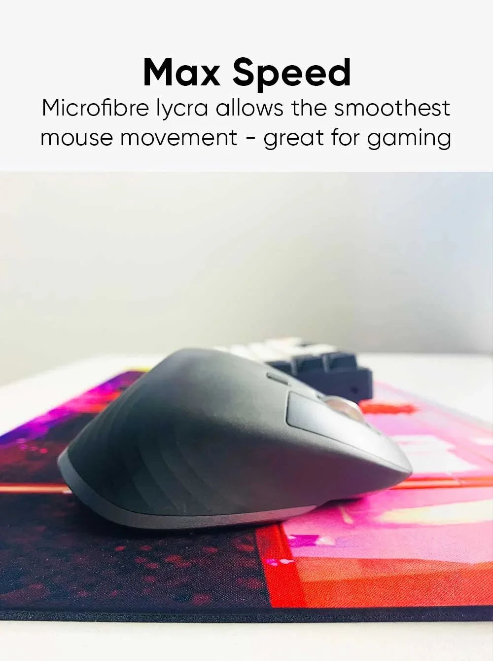 Close-up shot showing a mouse on the desk mat to demonstrate the "Max Speed" feature.