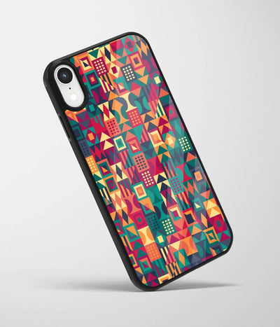 An angled view of a glass phone case featuring a vibrant design.