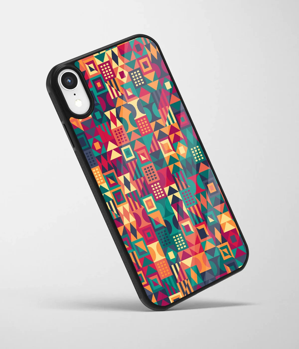 An angled view of a glass phone case featuring a vibrant design.