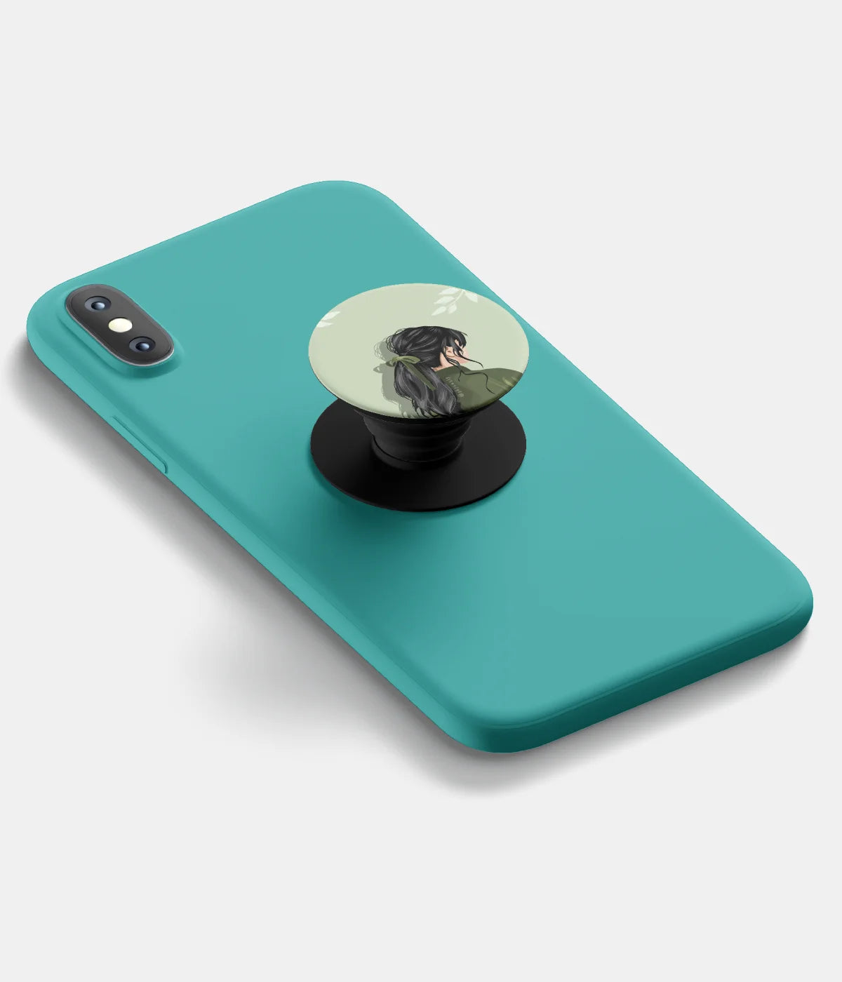 A top-down view of a phone grip holder attached to a mobile phone case on a white background