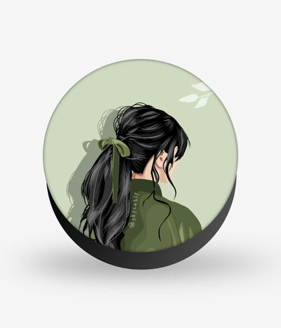 Mobile phone grip with a colorful design on a white background