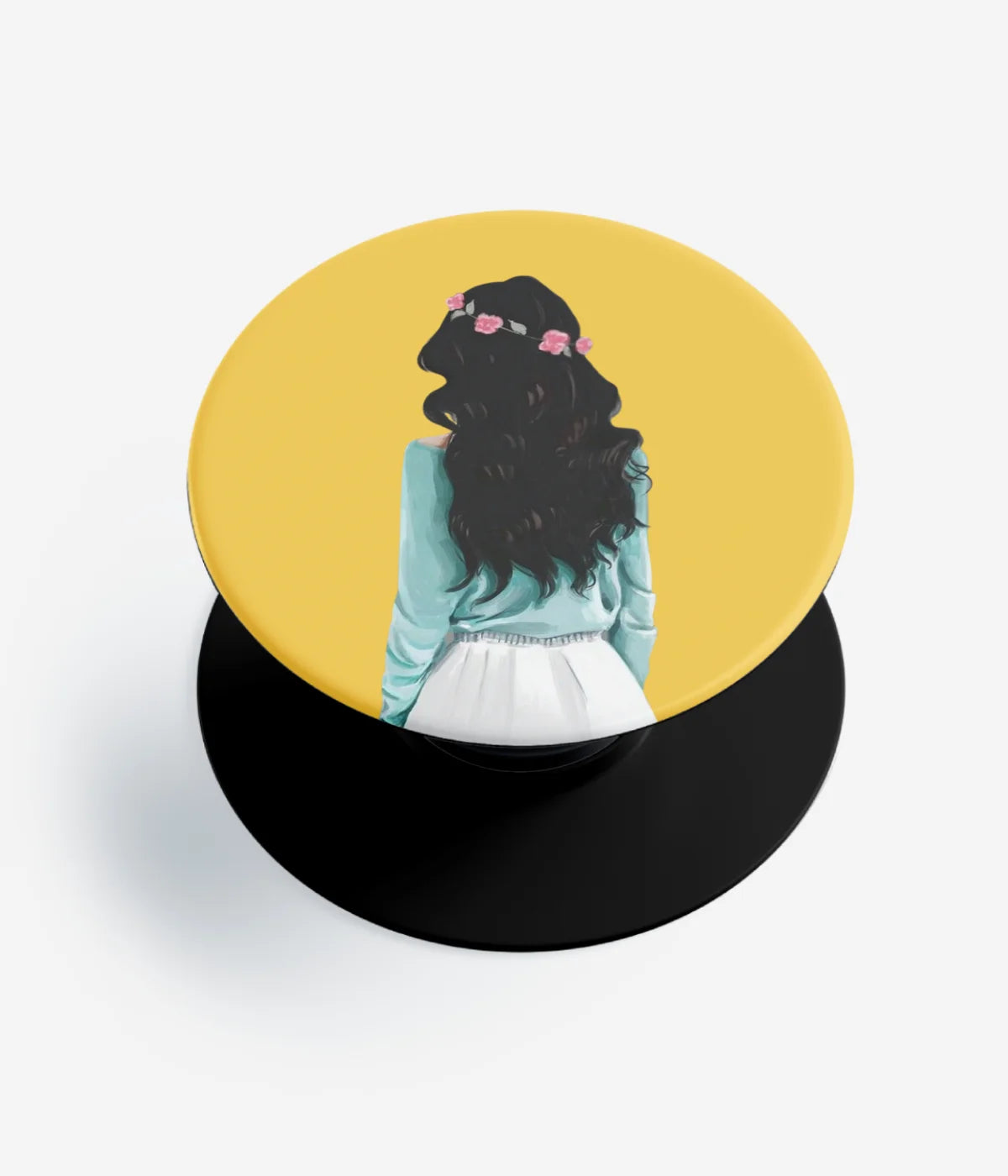 A top-down view of a phone grip holder on a clean white background