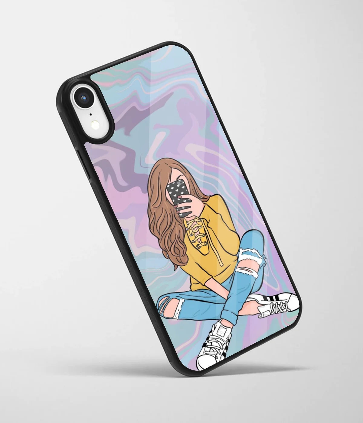 An angled view of a glass phone case featuring a vibrant design.