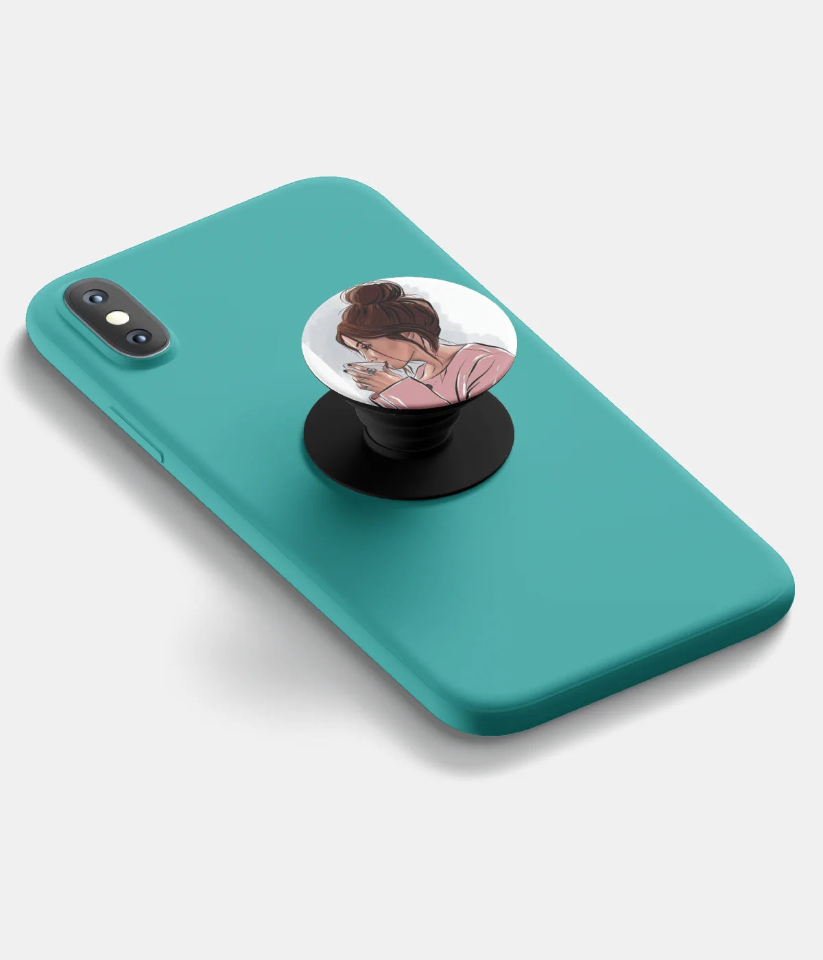 A top-down view of a phone grip holder attached to a mobile phone case on a white background