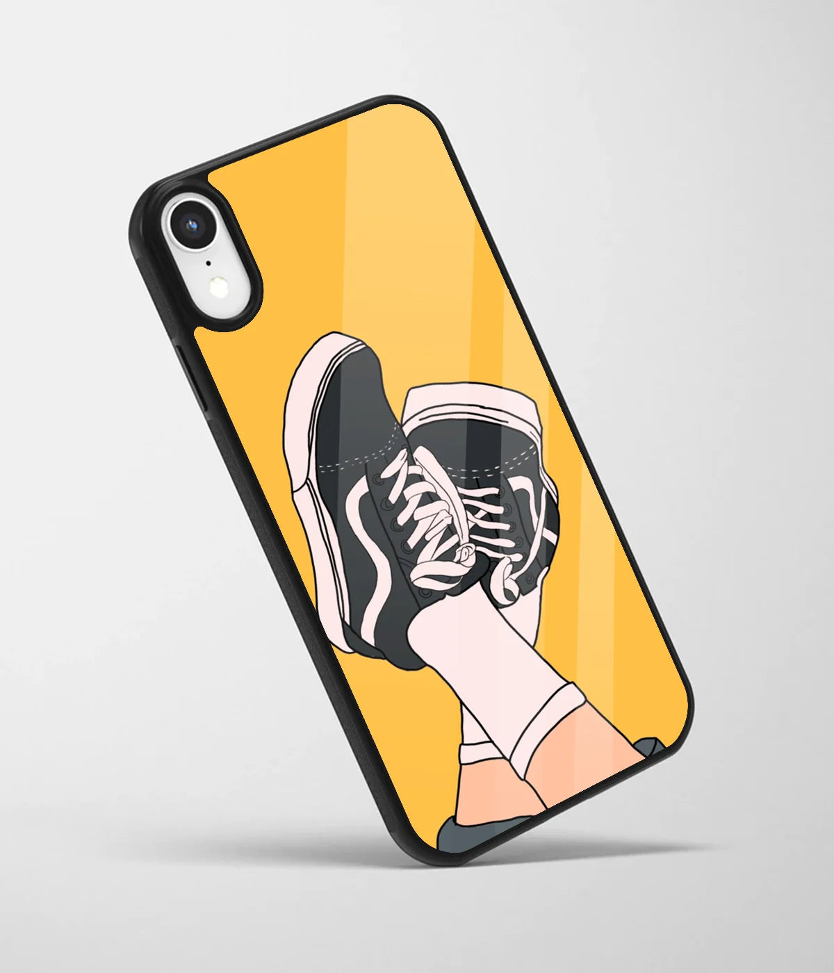 An angled view of a glass phone case featuring a vibrant design.