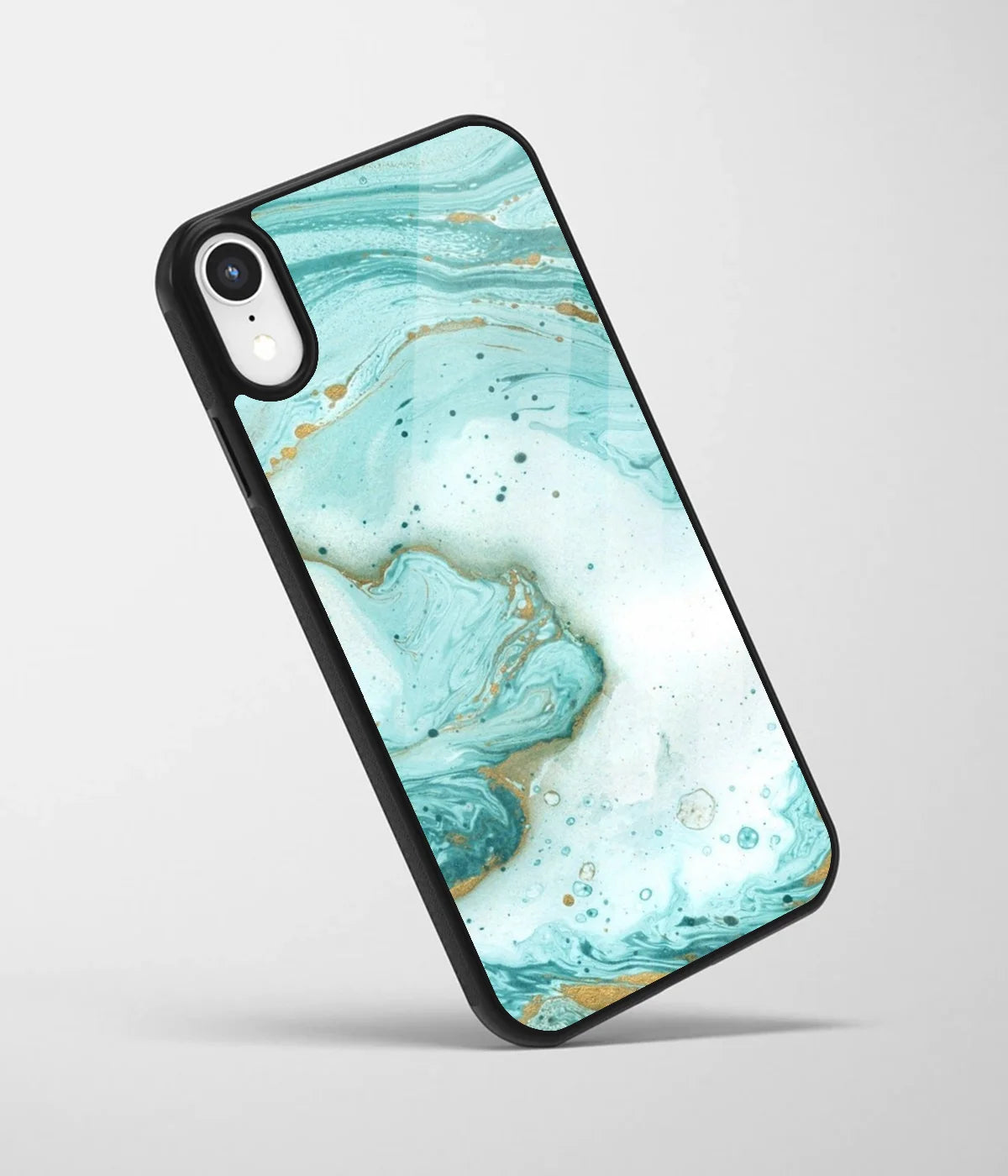 An angled view of a glass phone case featuring a vibrant design.