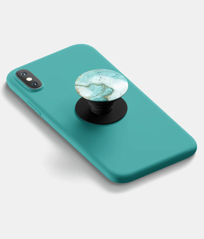 A top-down view of a phone grip holder attached to a mobile phone case on a white background