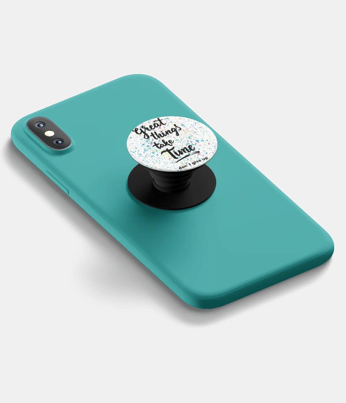 A top-down view of a phone grip holder attached to a mobile phone case on a white background